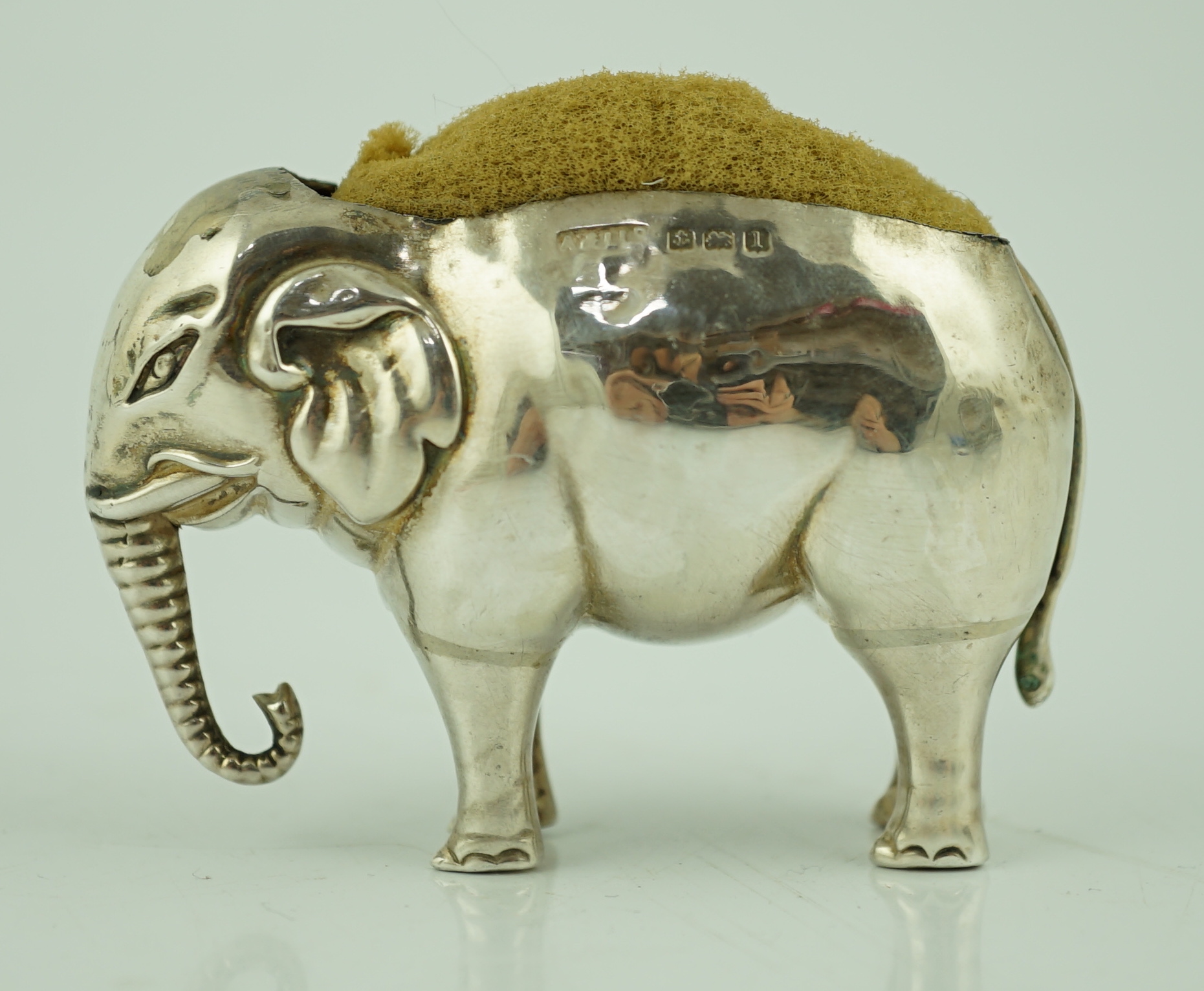 A George V novelty silver pin cushion, modelled as an elephant, Adie & Lovekin Ltd